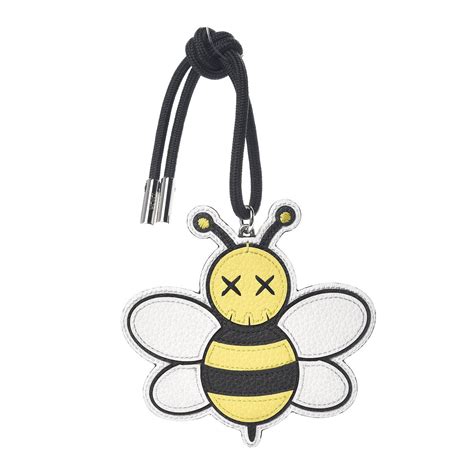 dior kaws bee charm|Dior x Kaws Bee Charm Yellow .